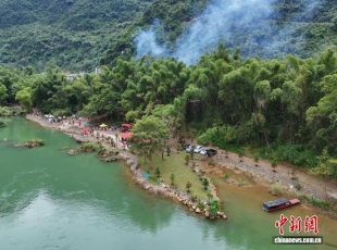 河池移民村美丽蜕变：从“耕地受限”到“山水生金”